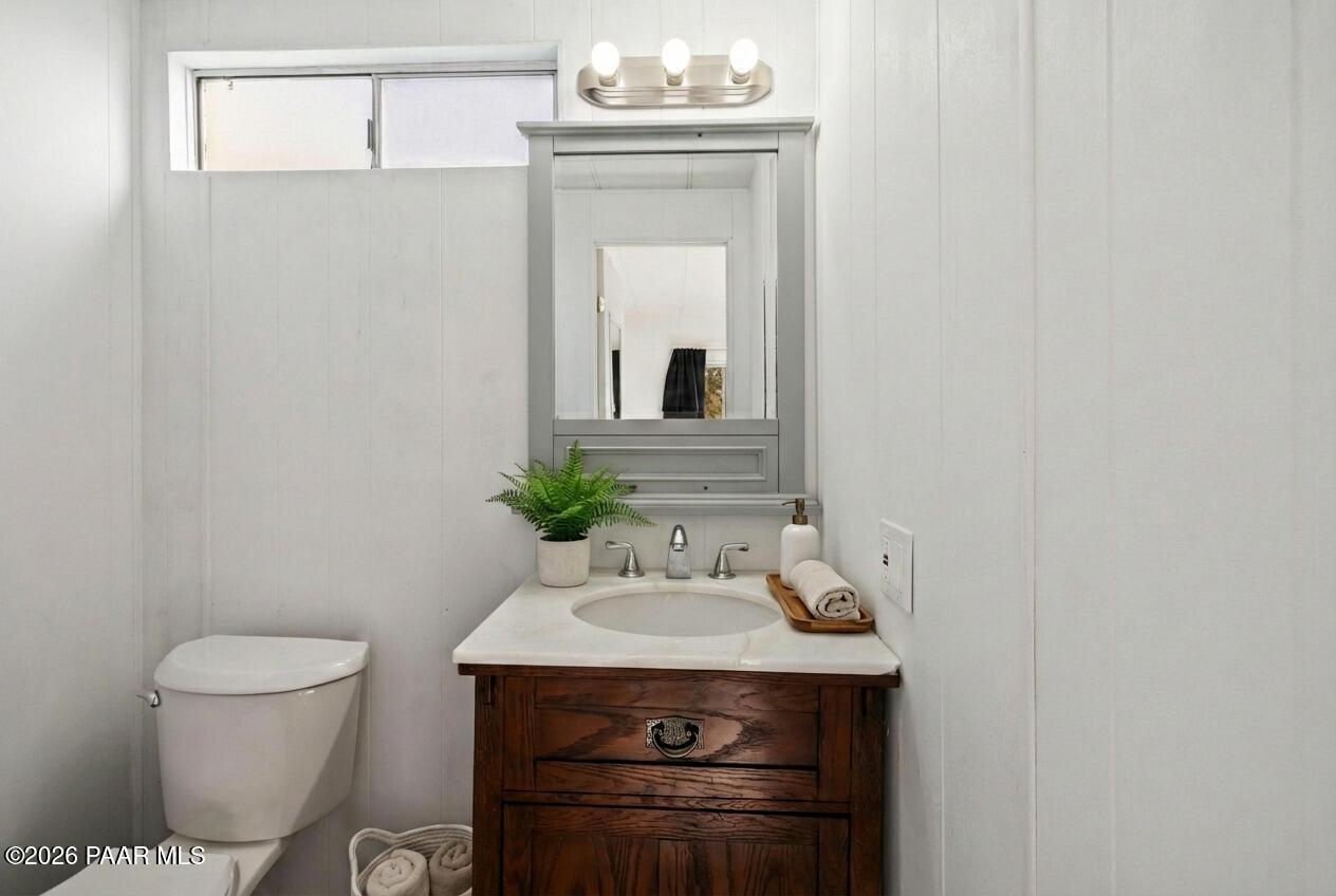 15455 South Rolling Ridge Drive Mayer, AZ 86333 - Photo 11 of 17 a bathroom with a sink and a mirror