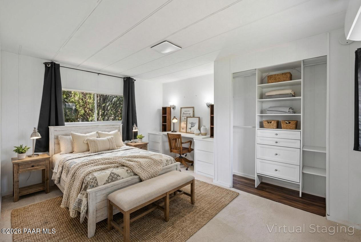 15455 South Rolling Ridge Drive Mayer, AZ 86333 - Photo 12 of 17 a bedroom with a bed and a dresser