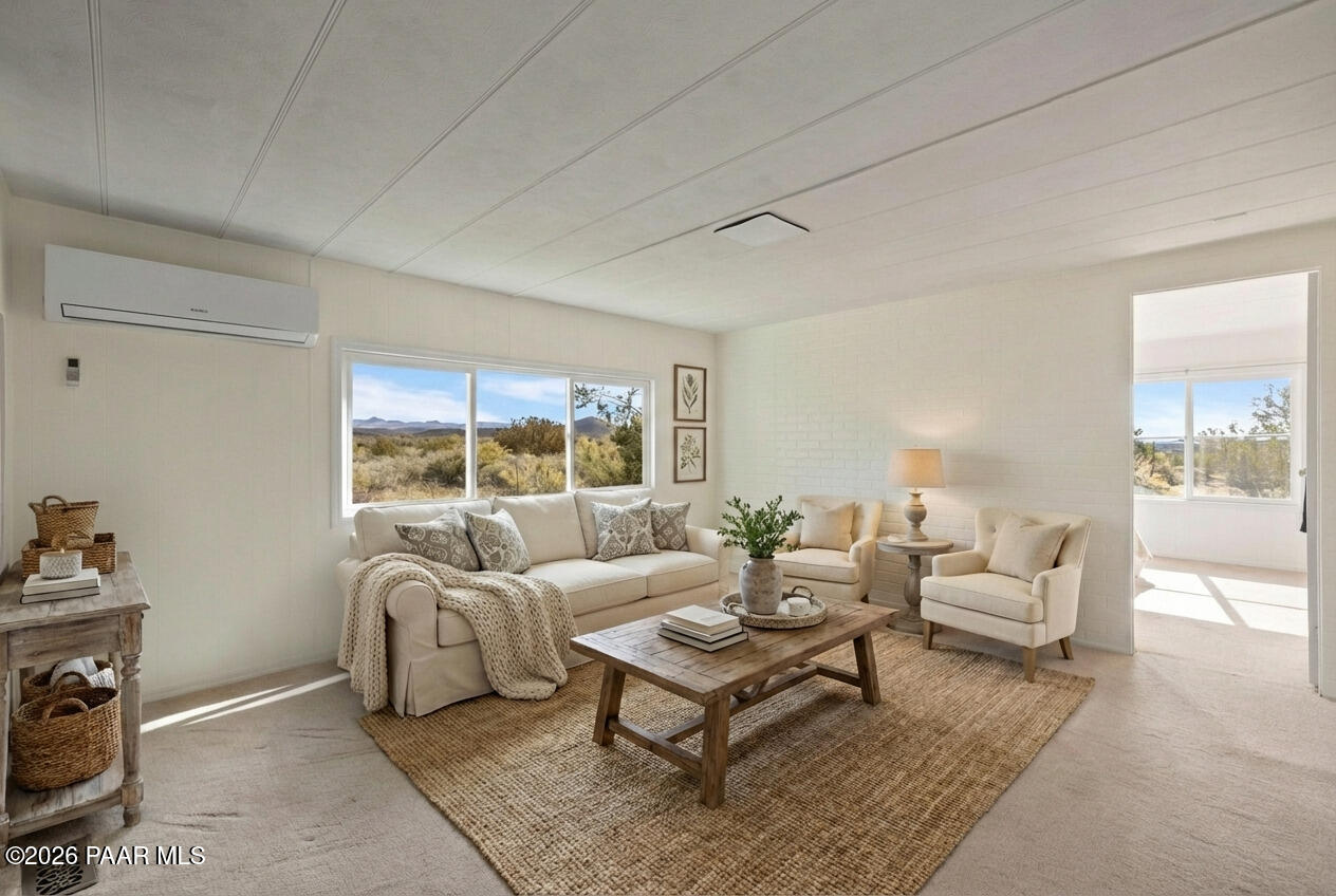 15455 South Rolling Ridge Drive Mayer, AZ 86333 - Photo 5 of 17 a living room with furniture and a fireplace