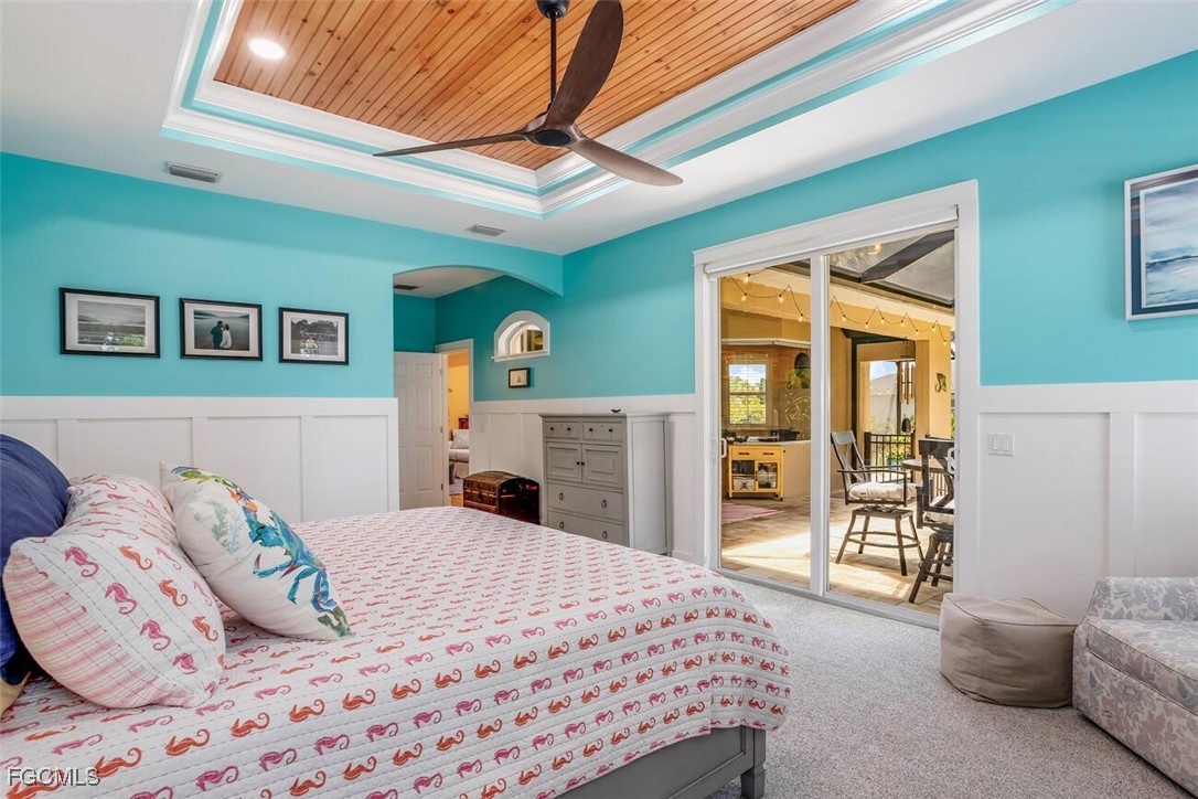 139 Crevalle Road Rotonda West, FL 33947 - Photo 13 of 24 a bedroom with a bed and a window