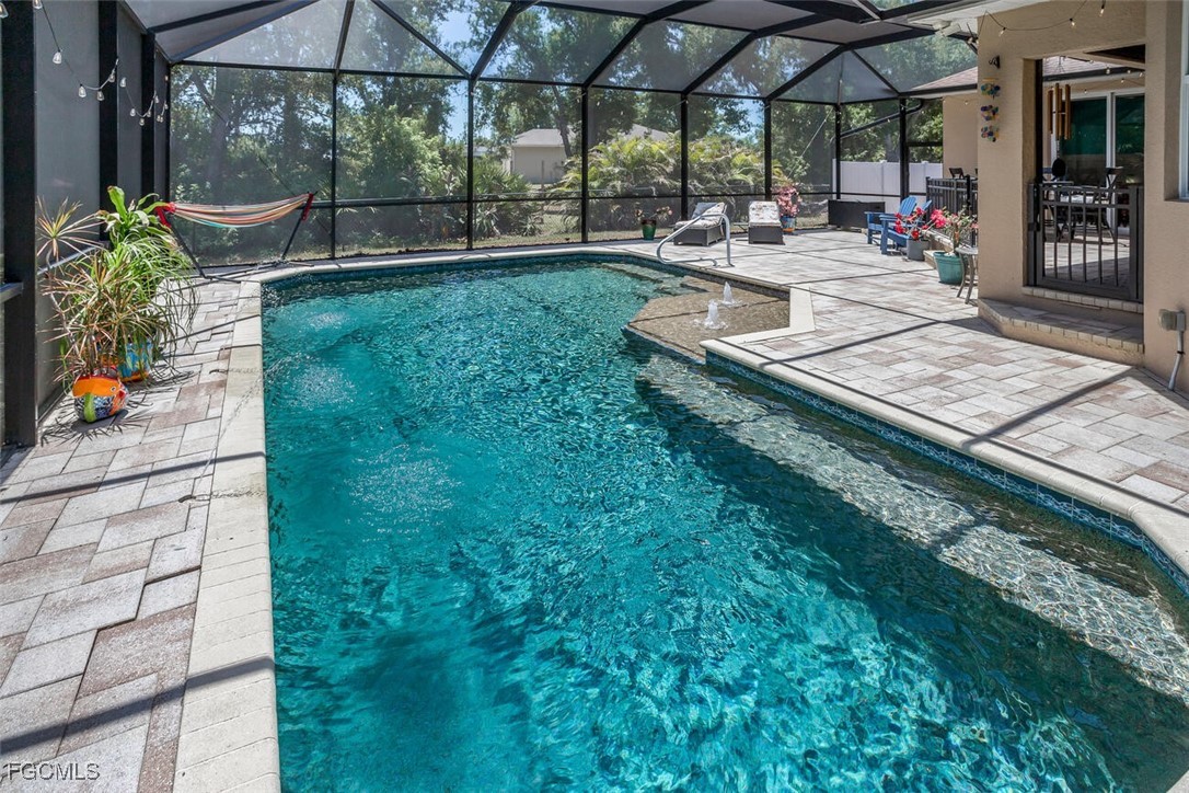 139 Crevalle Road Rotonda West, FL 33947 - Photo 18 of 24 an outdoor view of garden with patio