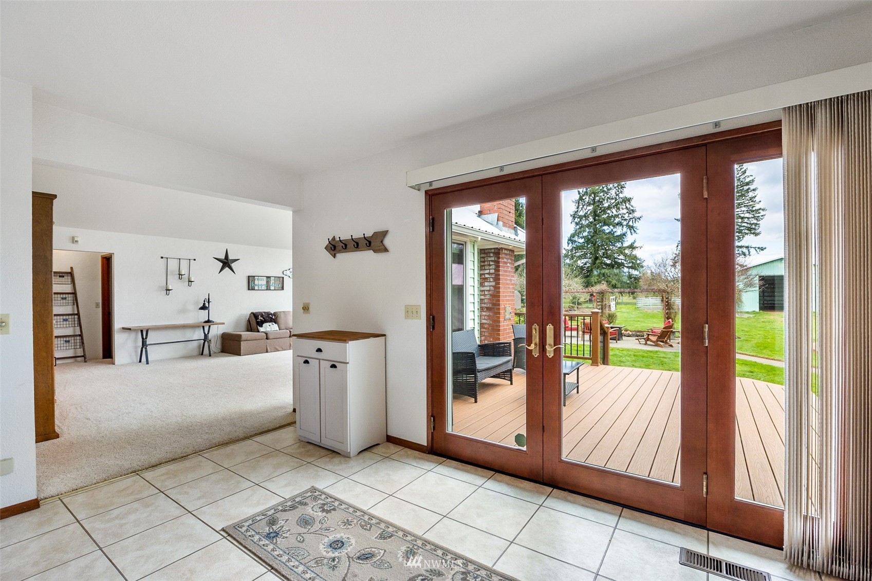1096 North Military Road Winlock, WA 98596 - Photo 11 of 40 a large white bed in a white room