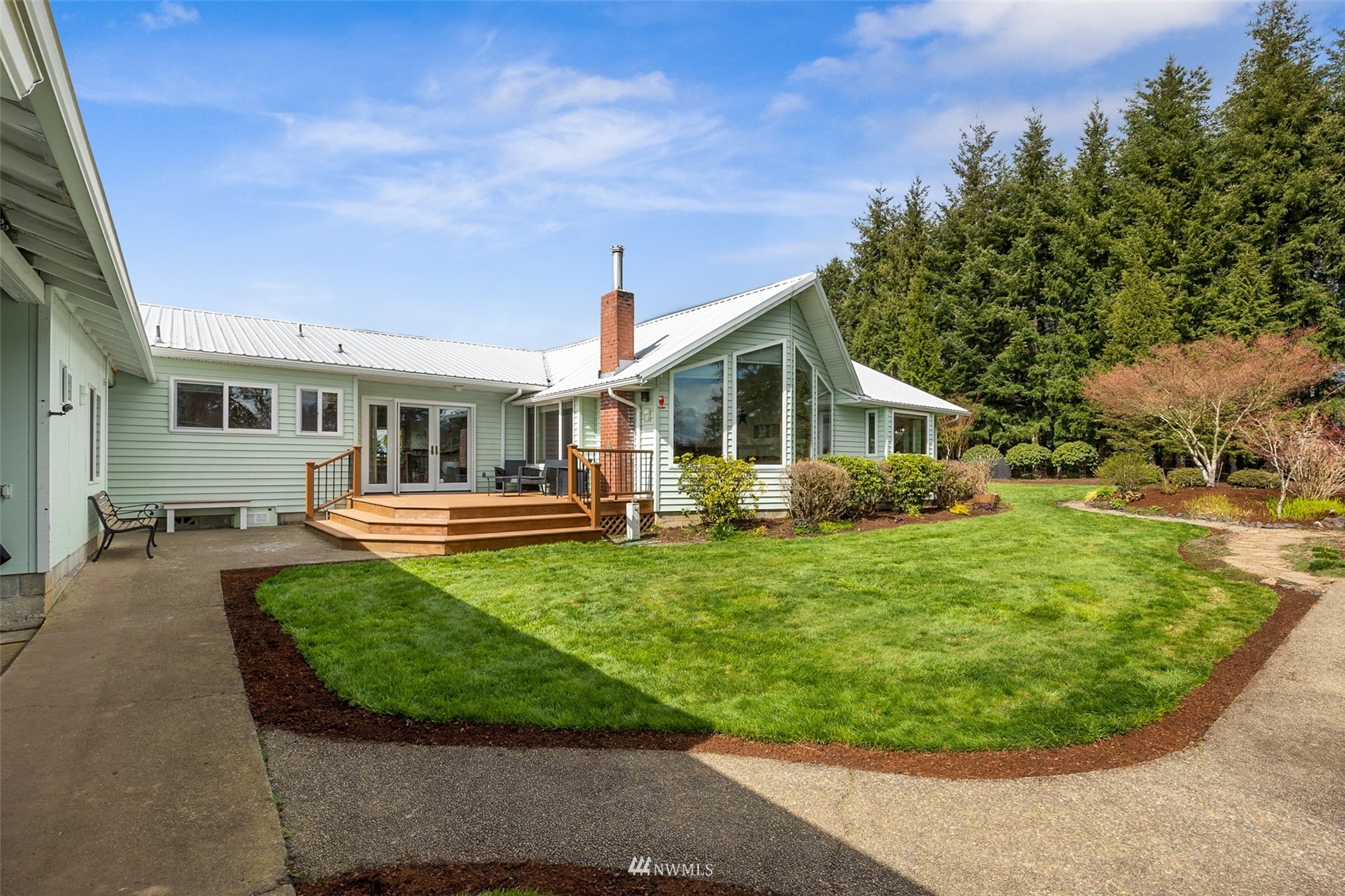 1096 North Military Road Winlock, WA 98596 - Photo 28 of 40 a view of a house with backyard porch and sitting area
