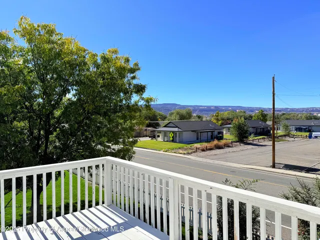 a balcony with view of city