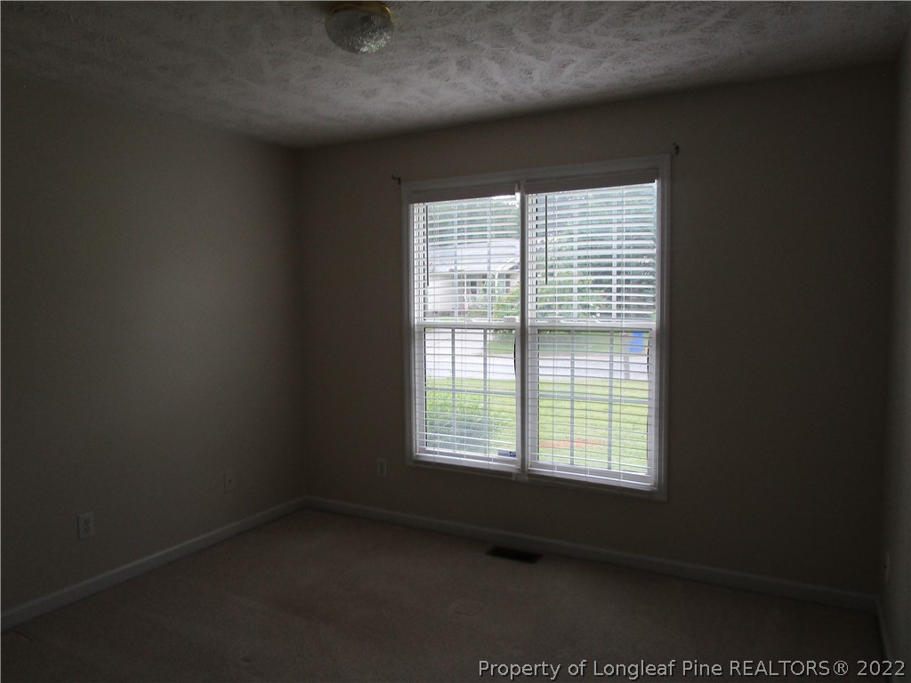 800 Turkey Ridge Drive Fayetteville, NC 28314 - Photo 22 of 23 a view of an empty room with a window