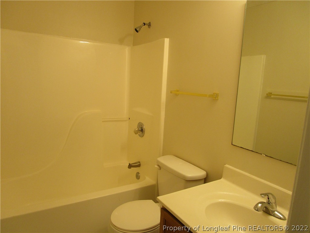 800 Turkey Ridge Drive Fayetteville, NC 28314 - Photo 23 of 23 a bathroom with a toilet sink and shower
