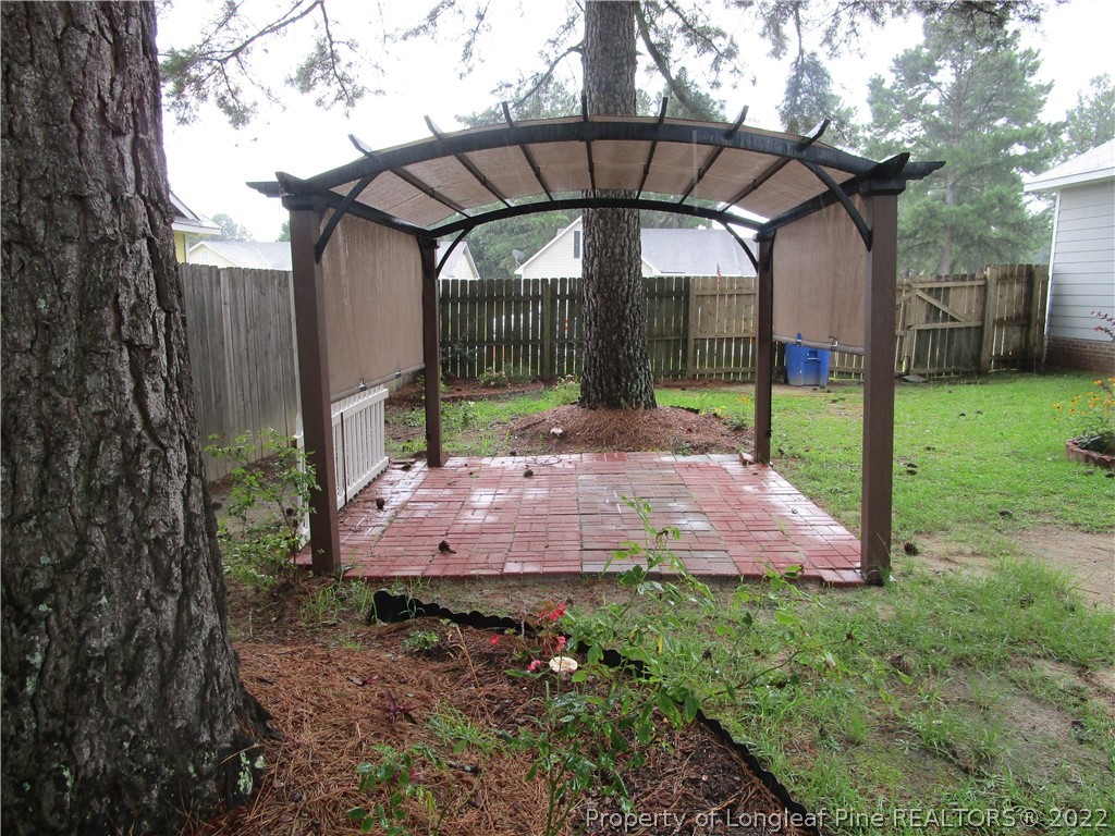 800 Turkey Ridge Drive Fayetteville, NC 28314 - Photo 5 of 23 a small garden covered with tall trees