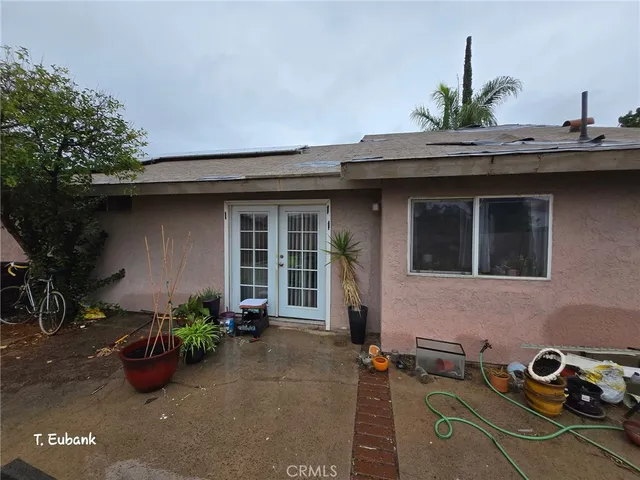 a front view of a house with patio