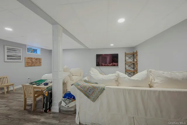 a living room with furniture and a table