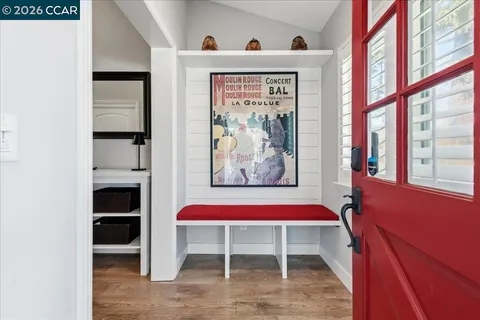 a view of a chairs and table on the patio