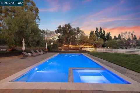 a view of outdoor space with swimming pool