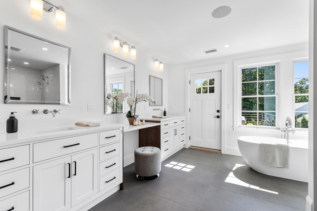 15 West Chardon Road Winchester, MA 01890 - Photo 34 of 42 a large bathroom with a large tub and sink