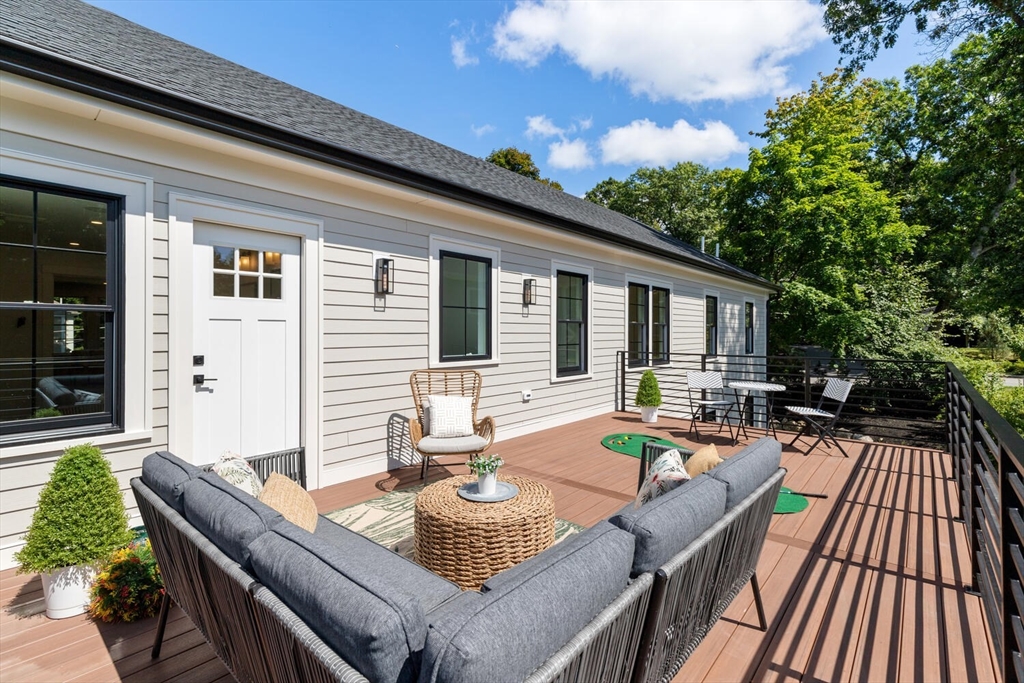 15 West Chardon Road Winchester, MA 01890 - Photo 36 of 42 a view of a house with pool and chairs