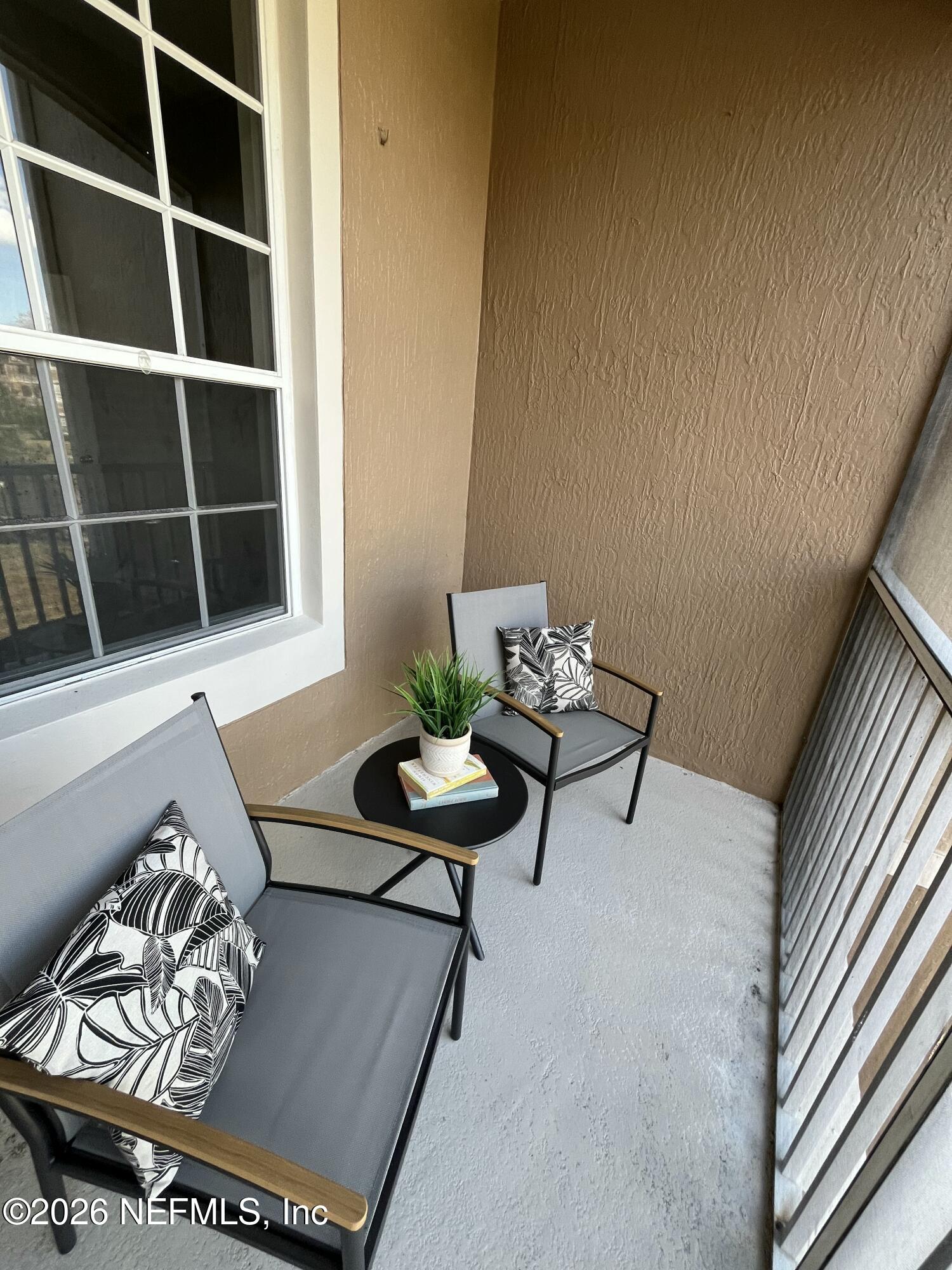 7990 Baymeadows Road East, Unit 907 Jacksonville, FL 32256 - Photo 18 of 19 Balcony1