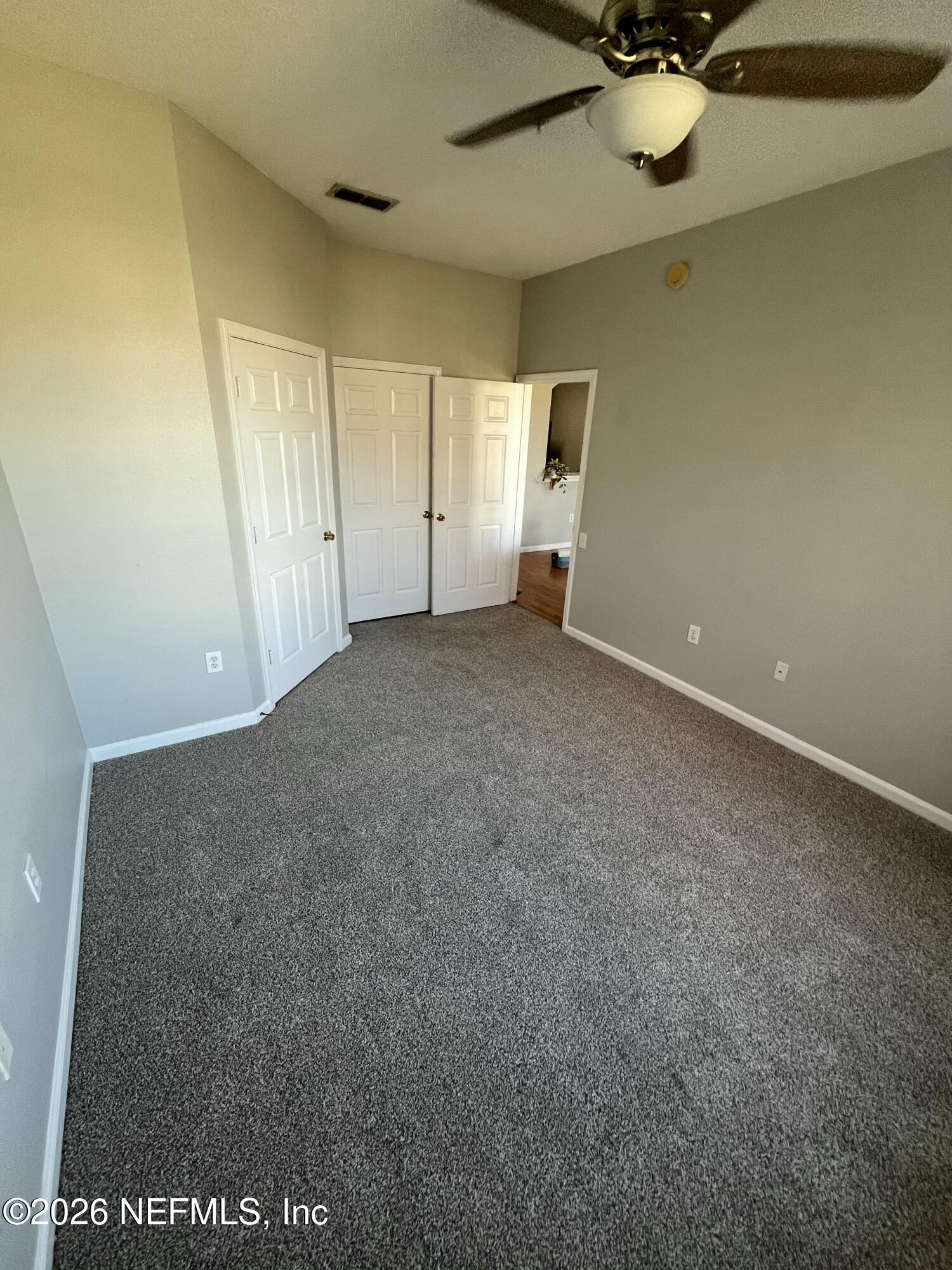 7990 Baymeadows Road East, Unit 907 Jacksonville, FL 32256 - Photo 9 of 19 Primary Bedroom
