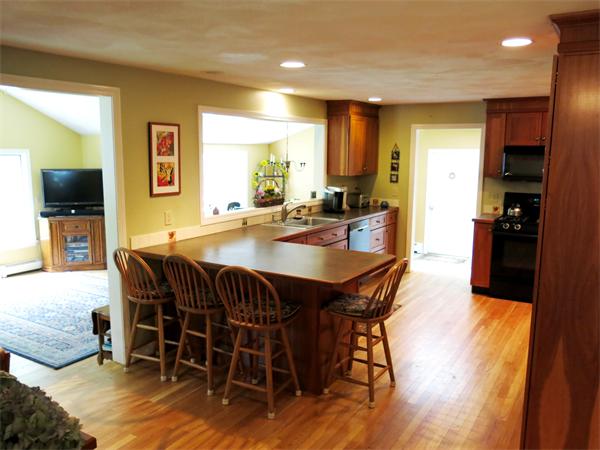 167 Bare Hill Road Boxford, MA 01921 - Photo 11 of 28 a view of a dining room with furniture