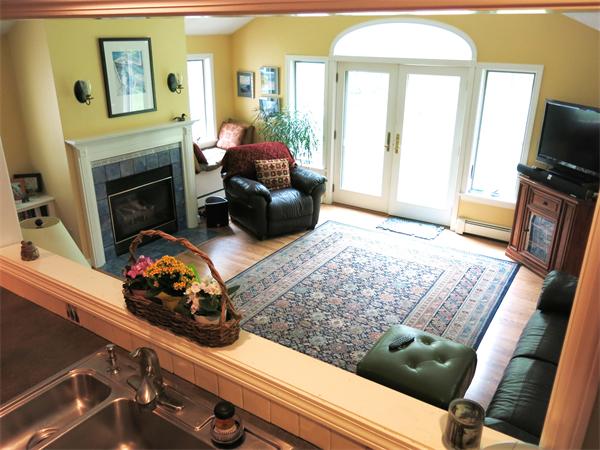 167 Bare Hill Road Boxford, MA 01921 - Photo 12 of 28 a living room with furniture fireplace and a flat screen tv