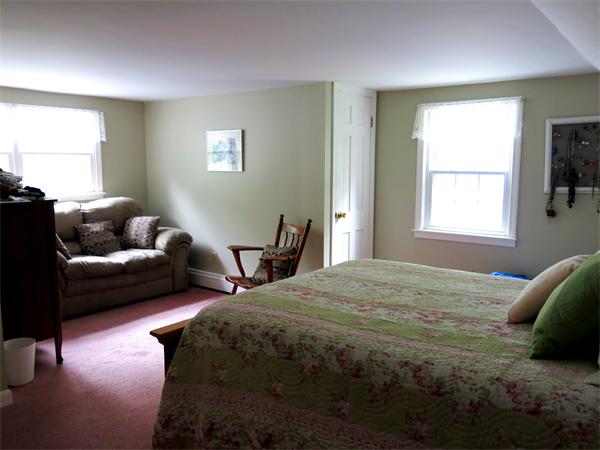 167 Bare Hill Road Boxford, MA 01921 - Photo 17 of 28 a bedroom with a bed couch and a window