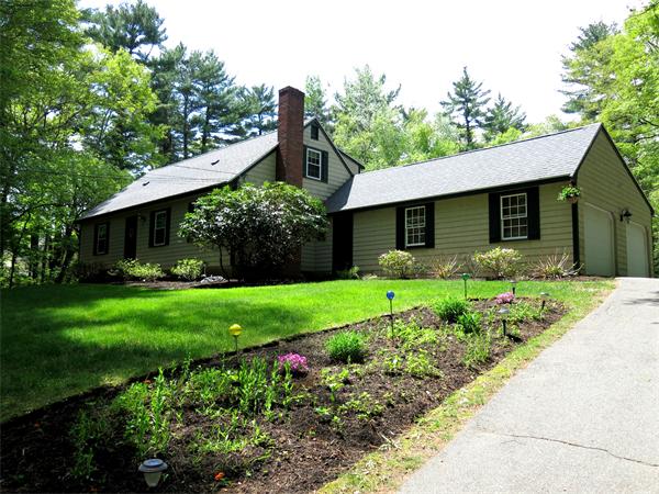 167 Bare Hill Road Boxford, MA 01921 - Photo 2 of 28 a front view of a house with garden
