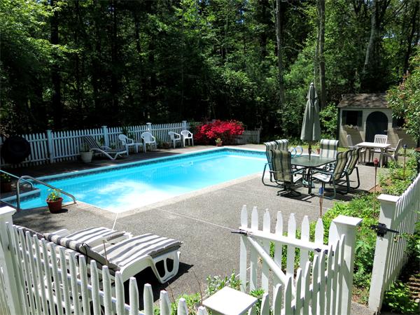 167 Bare Hill Road Boxford, MA 01921 - Photo 24 of 28 a view of a patio with chairs and potted plants