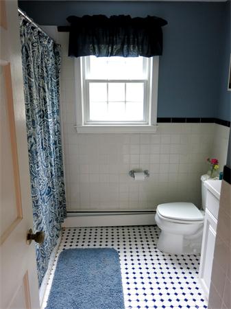 167 Bare Hill Road Boxford, MA 01921 - Photo 25 of 28 a bathroom with a toilet a window and a shower