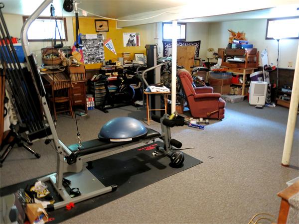 167 Bare Hill Road Boxford, MA 01921 - Photo 26 of 28 a room with gym equipment and a mirror