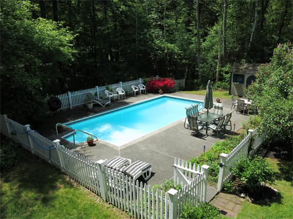 167 Bare Hill Road Boxford, MA 01921 - Photo 28 of 28 a view of a chairs and table on the patio