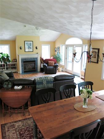 167 Bare Hill Road Boxford, MA 01921 - Photo 4 of 28 a living room with furniture a fireplace and a table
