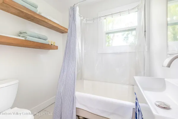 a bathroom with a sink and a bathtub
