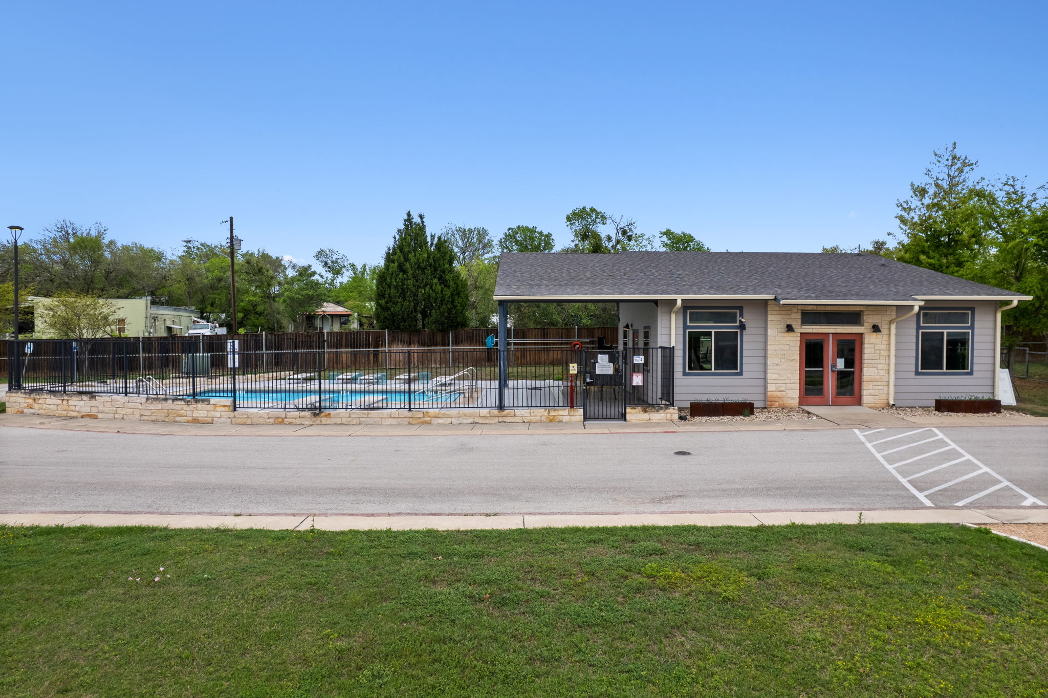 7805 Cooper Lane, Unit 606 Austin, TX 78745 - Photo 29 of 35 a view of a house with backyard porch and sitting area