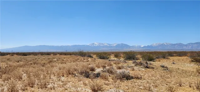 a view of lake and mountain
