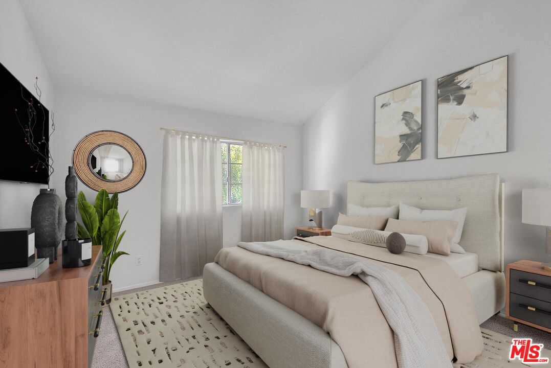 8741 Darby Avenue, Unit 16 Northridge, CA 91325 - Photo 26 of 43 a bedroom with a bed and a dresser