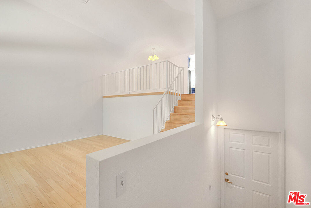 8741 Darby Avenue, Unit 16 Northridge, CA 91325 - Photo 10 of 43 a view of a kitchen with white walls