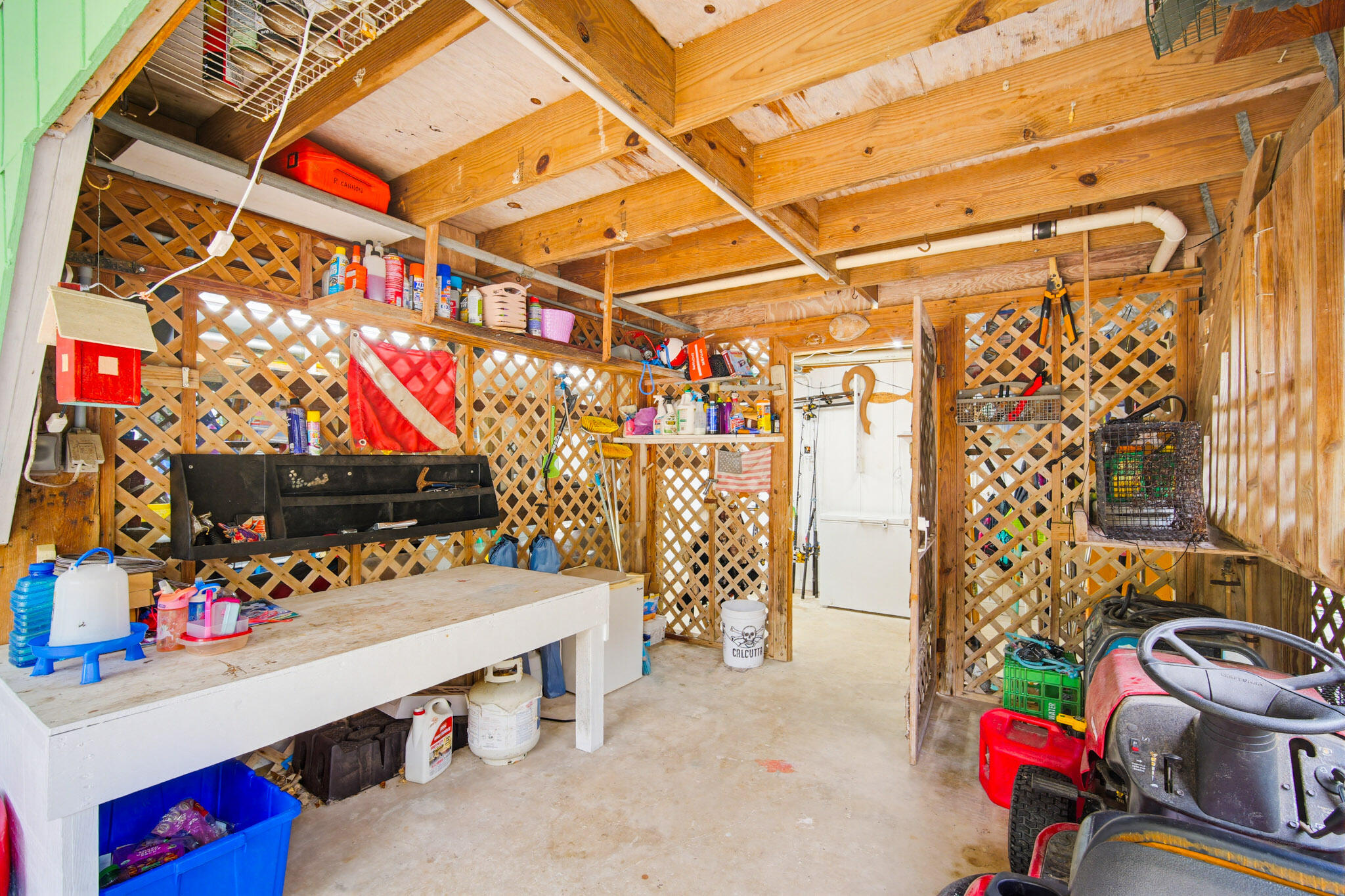 1258 Division Street Big Pine Key, FL 33043 - Photo 18 of 71 a room with storage and a utility room