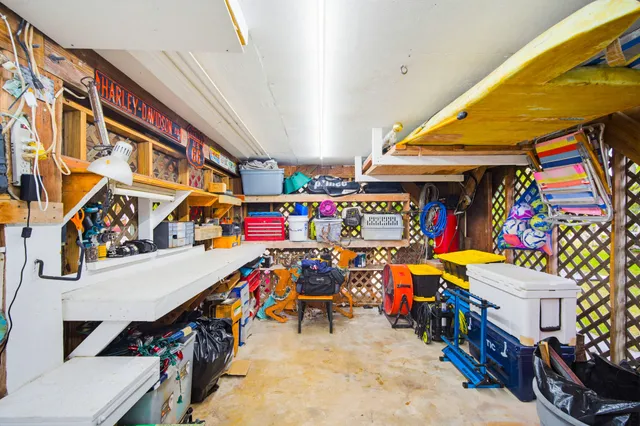 a kitchen with a sink and a stove top oven