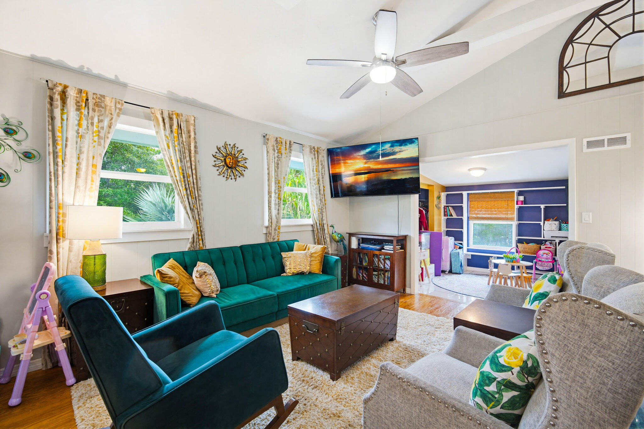 1258 Division Street Big Pine Key, FL 33043 - Photo 29 of 71 a living room with fireplace furniture and a flat screen tv