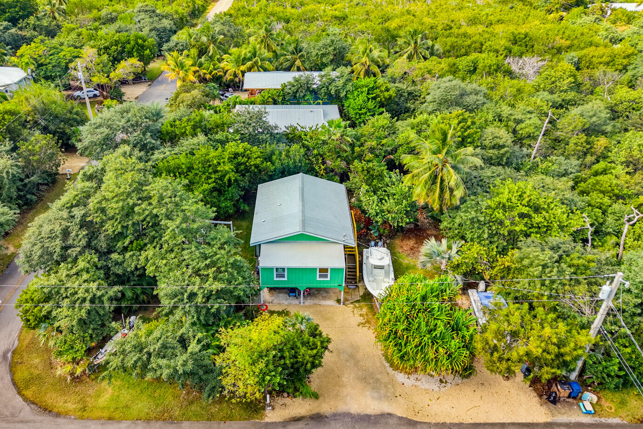 1258 Division Street Big Pine Key, FL 33043 - Photo 3 of 79 a picture of a yard with plants and lake view