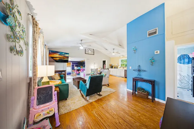a bathroom with a sink a vanity and a mirror