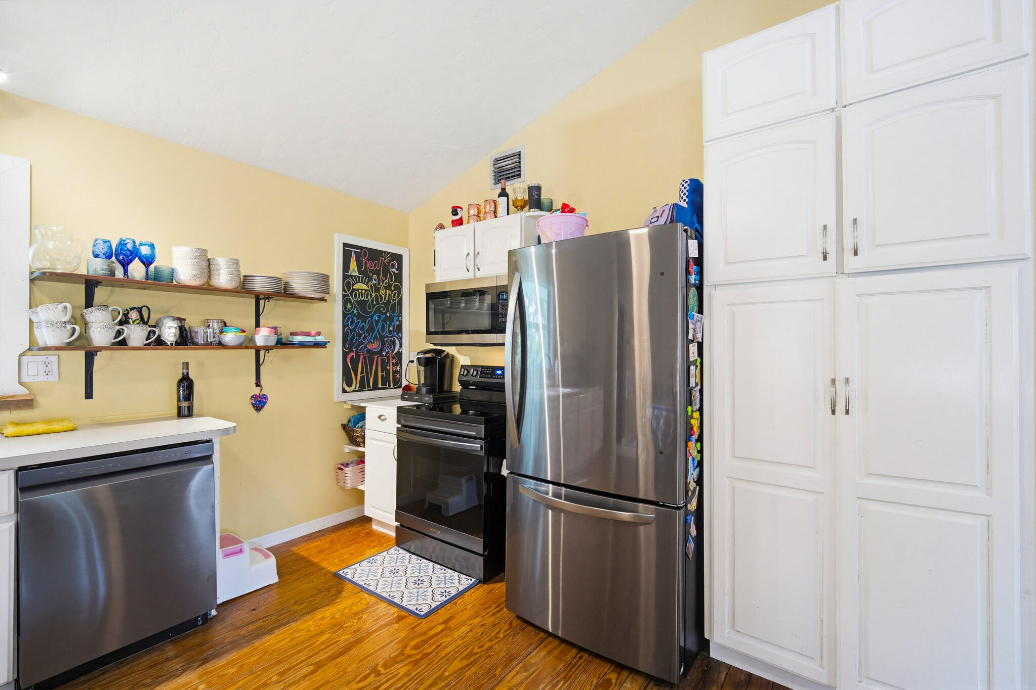 1258 Division Street Big Pine Key, FL 33043 - Photo 39 of 71 a kitchen with stainless steel appliances a refrigerator stove and sink
