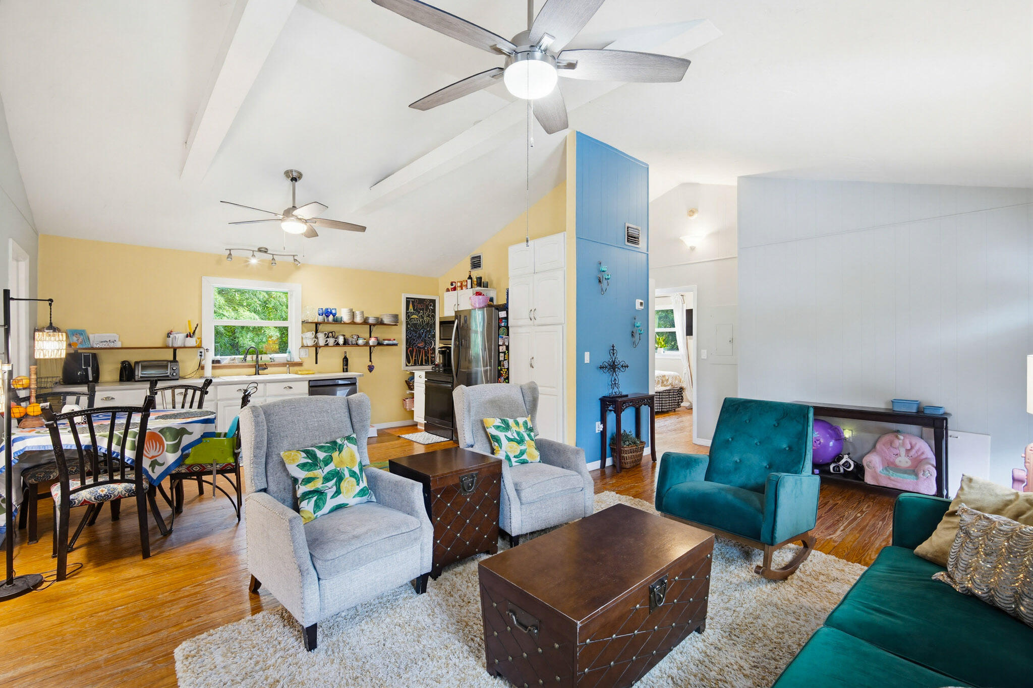 1258 Division Street Big Pine Key, FL 33043 - Photo 39 of 79 a living room with furniture and a dining table with kitchen view