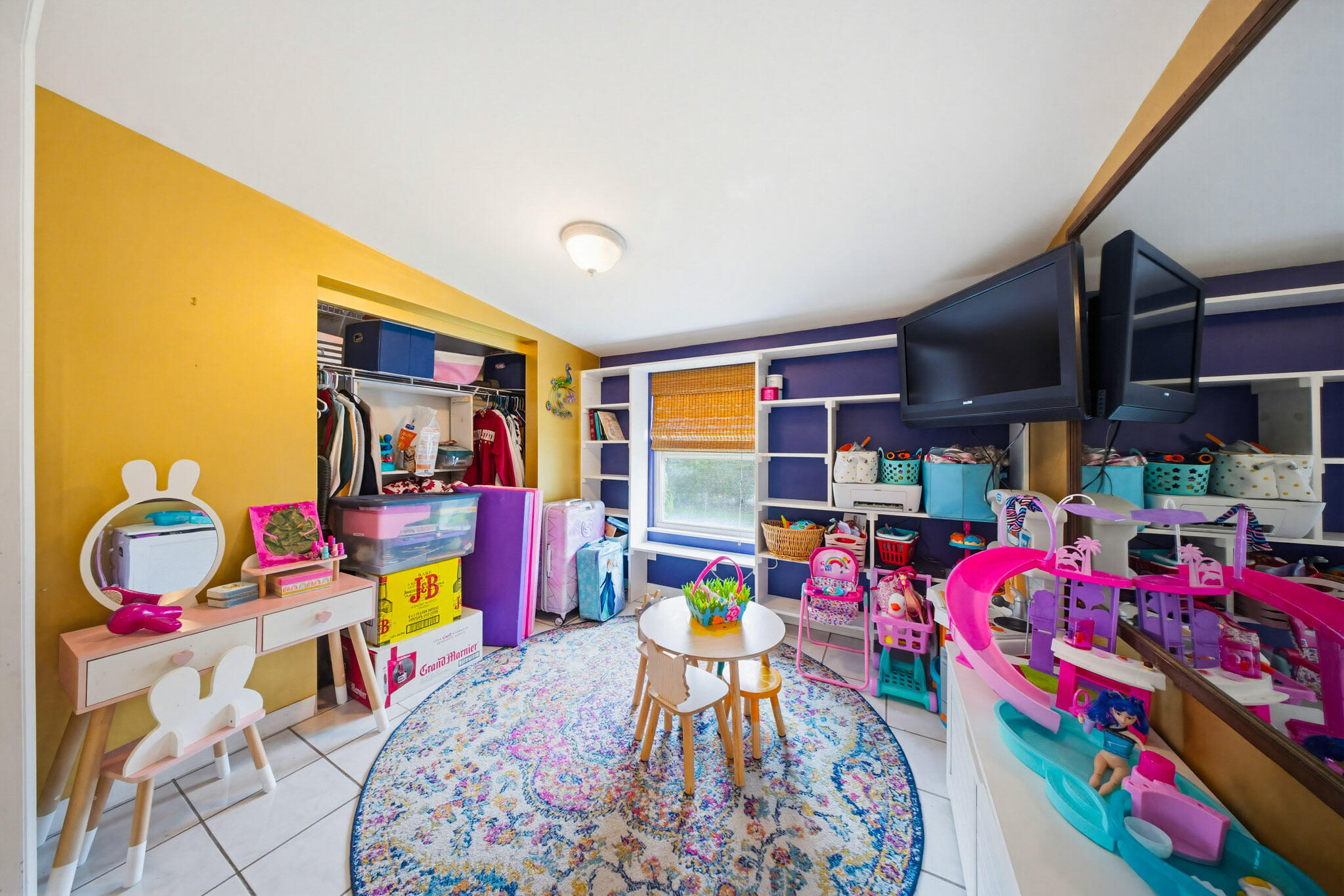 1258 Division Street Big Pine Key, FL 33043 - Photo 41 of 79 a living room filled with furniture and a baby crib
