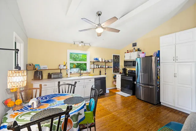 a backyard of a house with lots of green space