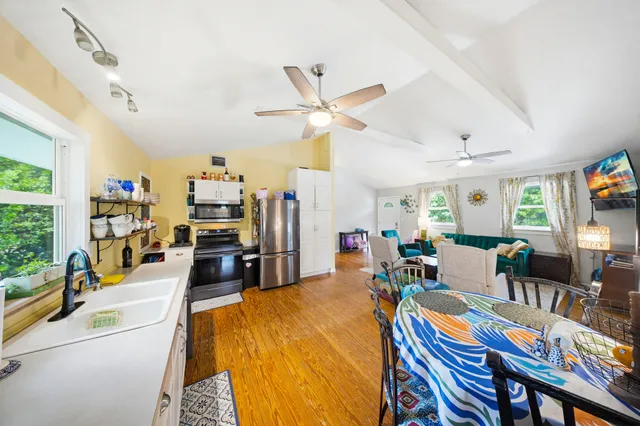 a backyard of a house with lots of green space