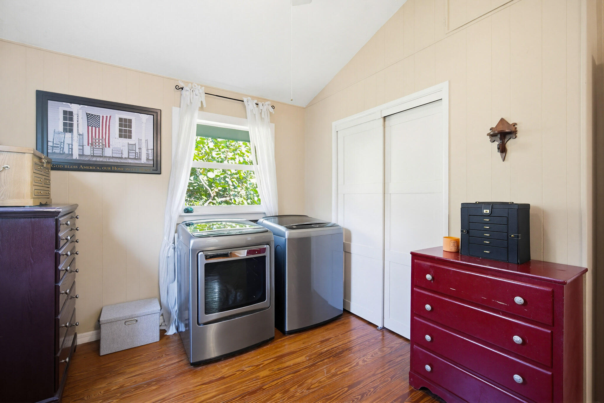 1258 Division Street Big Pine Key, FL 33043 - Photo 49 of 71 a view of a kitchen with a stove wooden floor cabinet and mirror