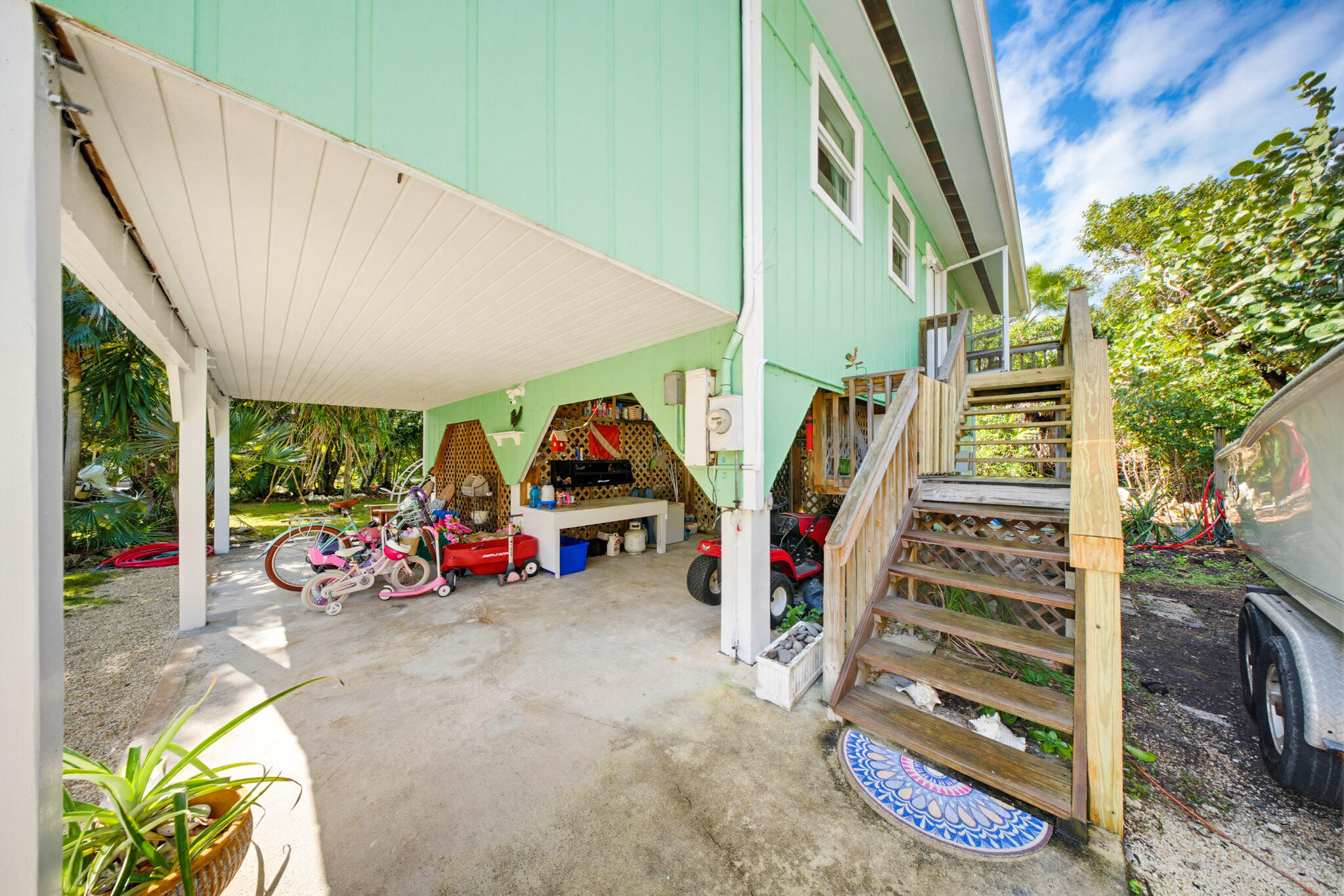 1258 Division Street Big Pine Key, FL 33043 - Photo 52 of 71 a view of a room with lots of trees and plants