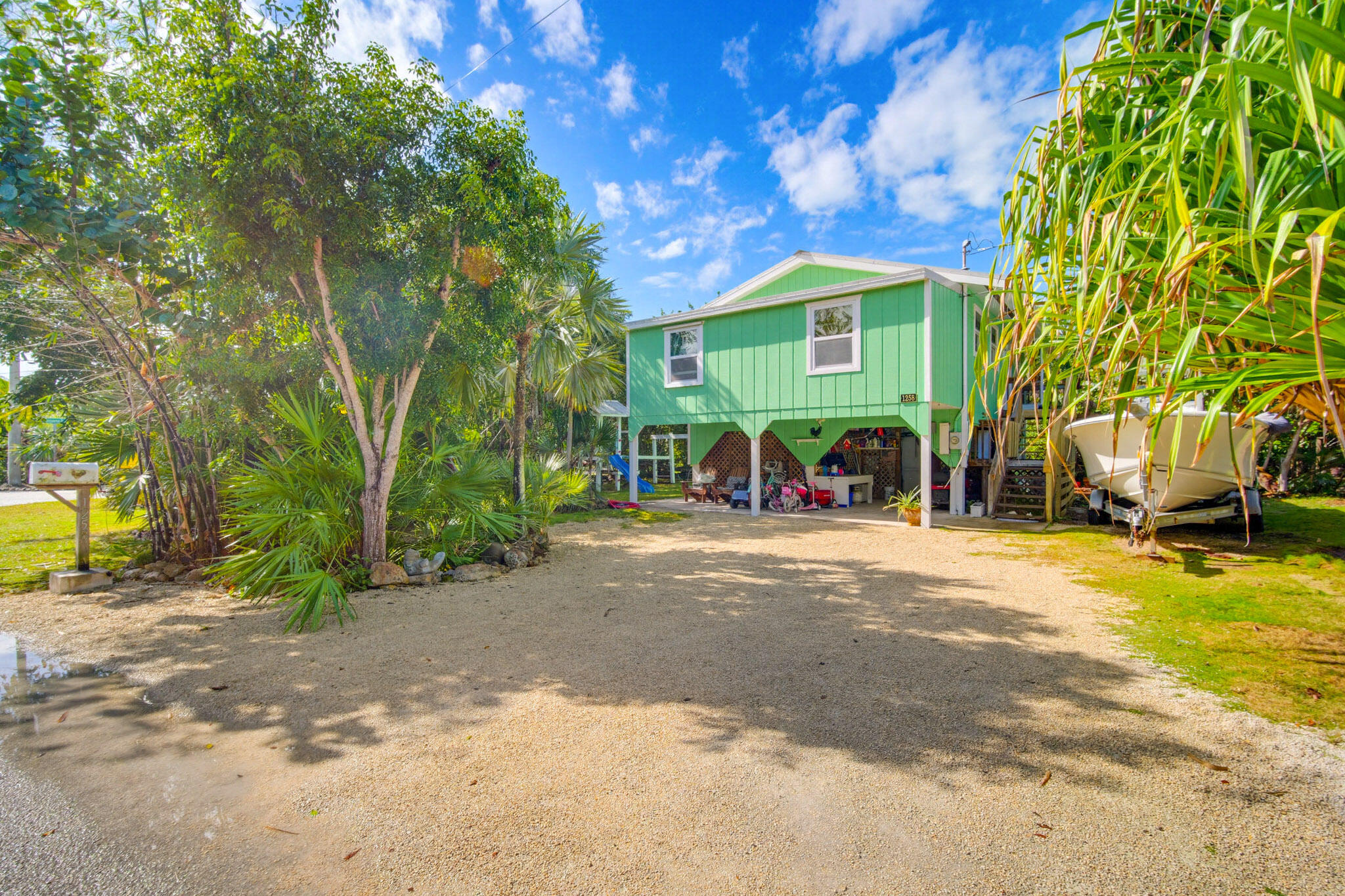 1258 Division Street Big Pine Key, FL 33043 - Photo 54 of 71 a view of a chairs in front of a building