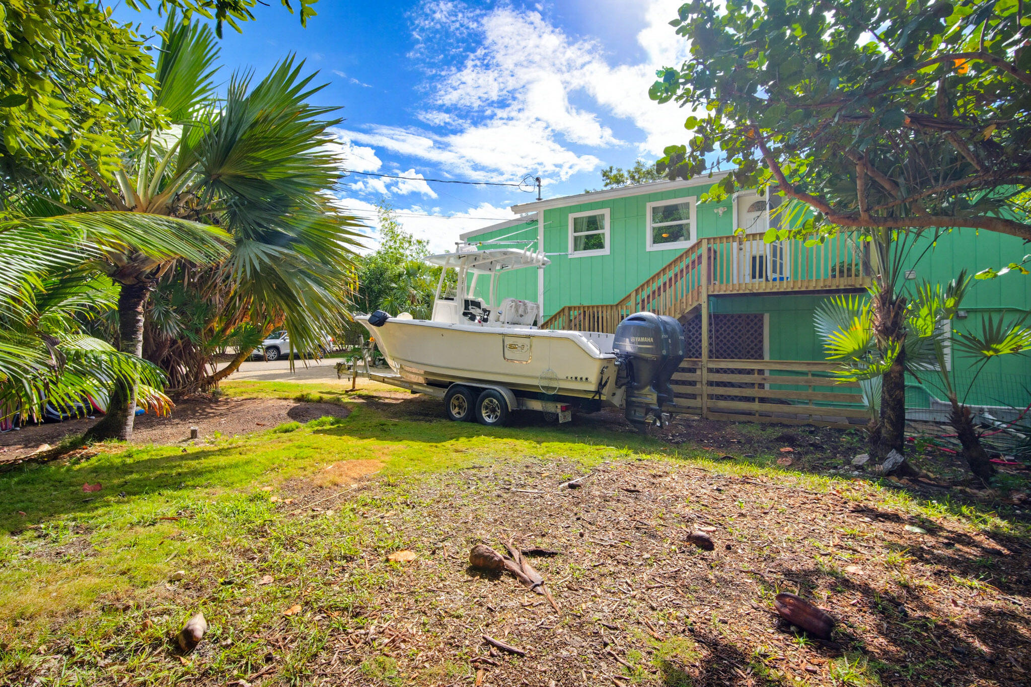 1258 Division Street Big Pine Key, FL 33043 - Photo 57 of 71 a view of swimming pool with lawn chairs and plants