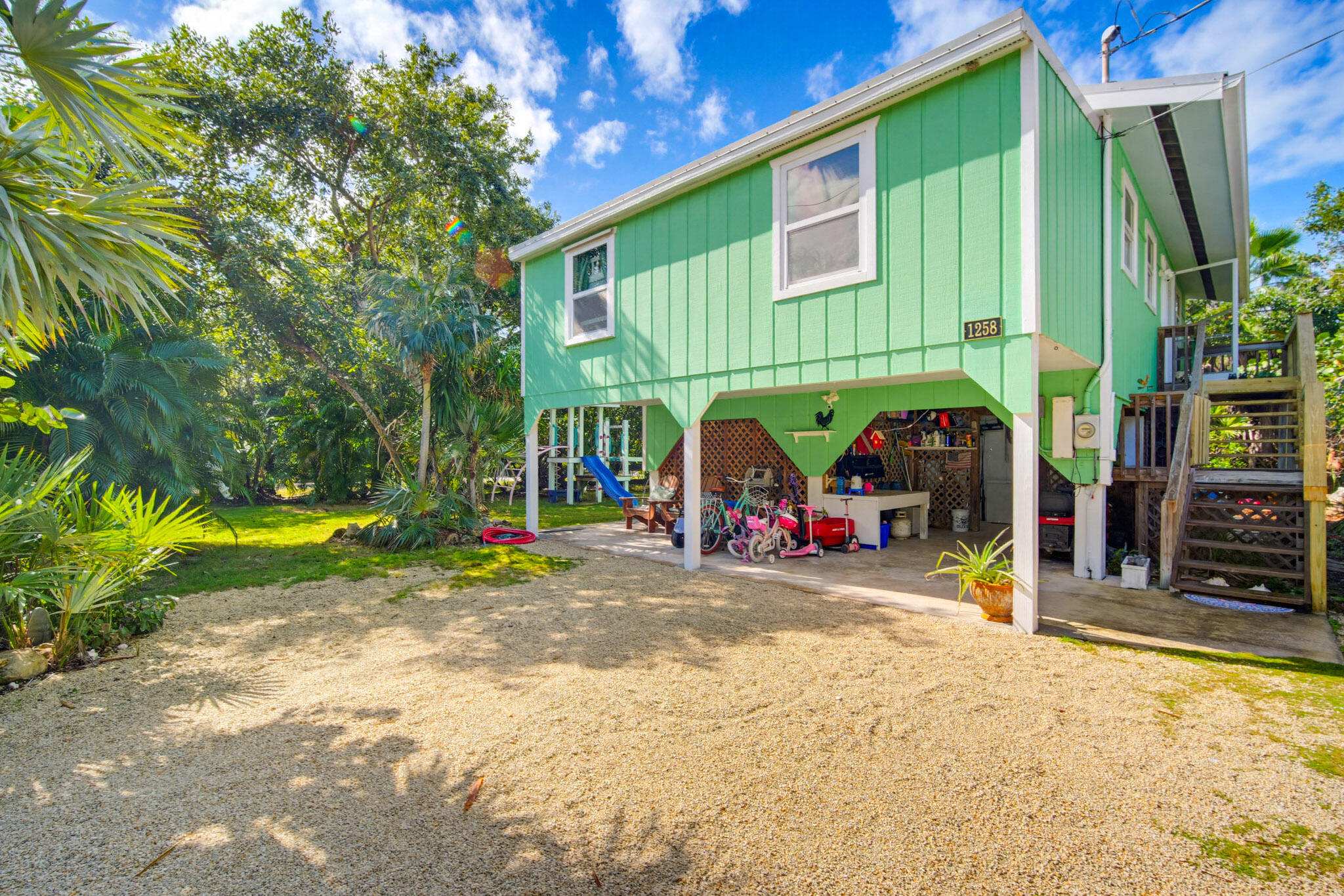 1258 Division Street Big Pine Key, FL 33043 - Photo 61 of 79 a view of a chairs in front of a house