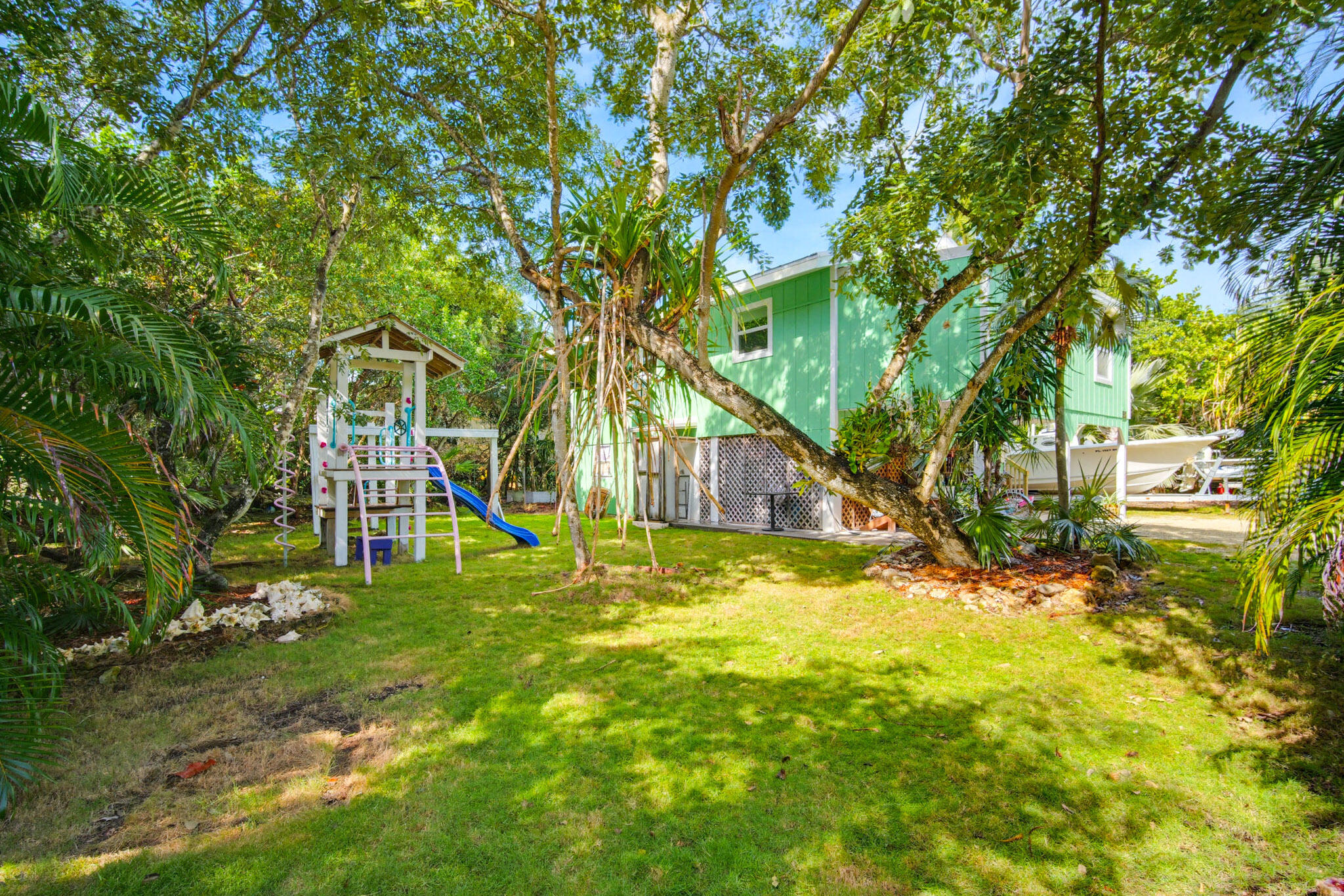1258 Division Street Big Pine Key, FL 33043 - Photo 63 of 71 a view of a houses with a yard