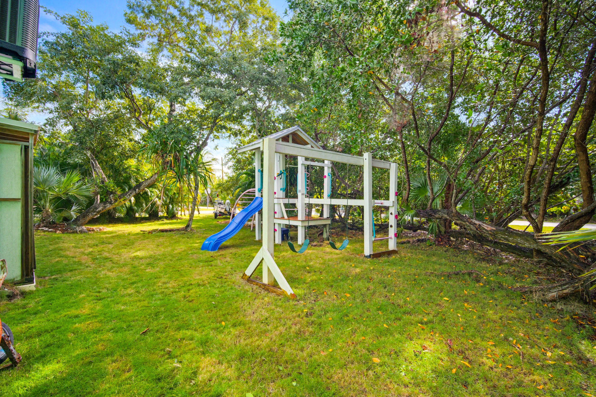 1258 Division Street Big Pine Key, FL 33043 - Photo 73 of 79 a view of a house with a backyard